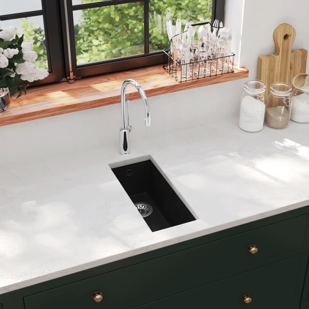Kitchen sink with overflow black granite