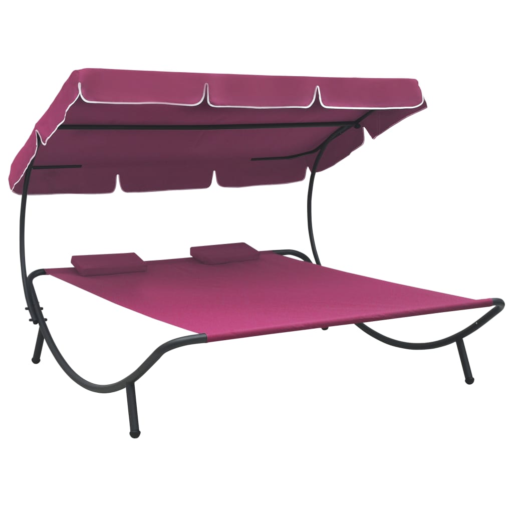 Garden sun lounger with sun canopy and pink cushions